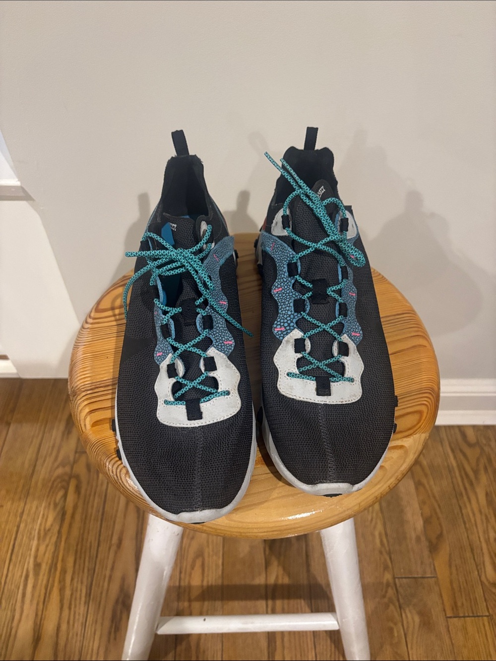 Nike React Black Sneakers with Teal Laces and Light Gray Overlays
